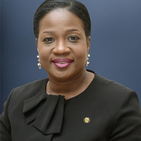 Dr. Tomi Coker